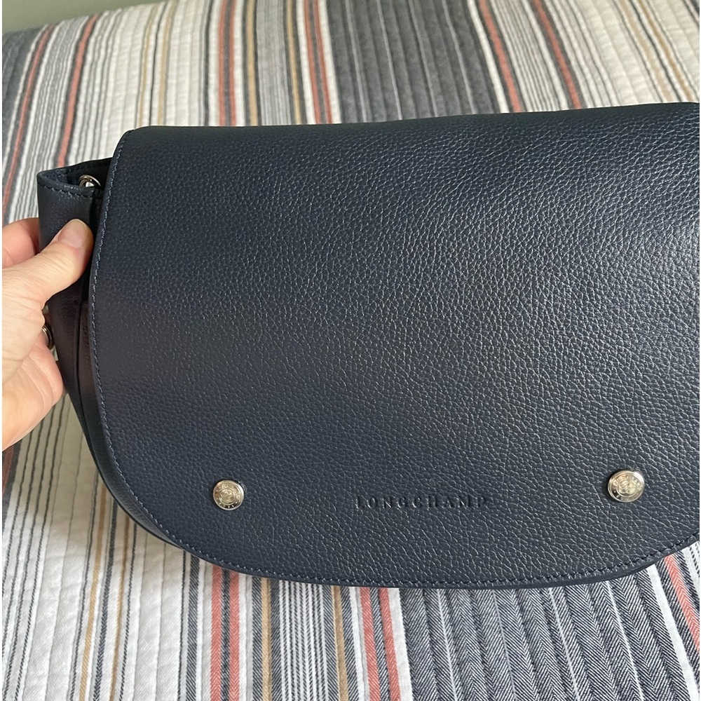 Longchamp Le Foulonne Saddle Bag. Beautiful,classic with plenty of pockets.